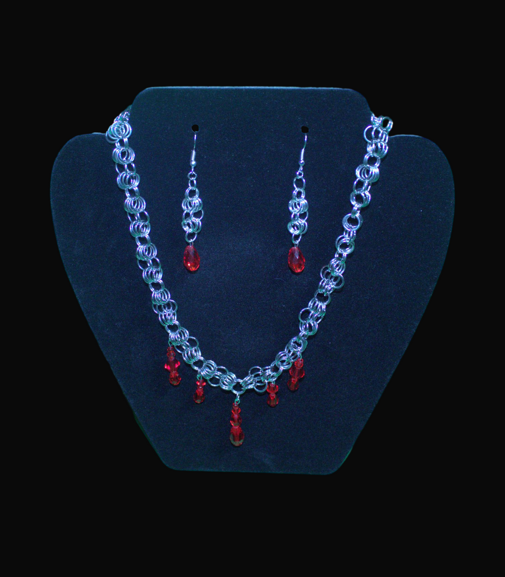 handcrafted chain mail Necklace and matching earrings with ruby glass stones