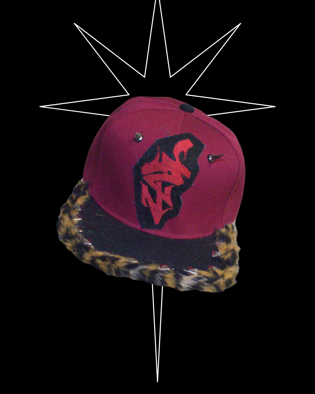 Red and black animal print hat